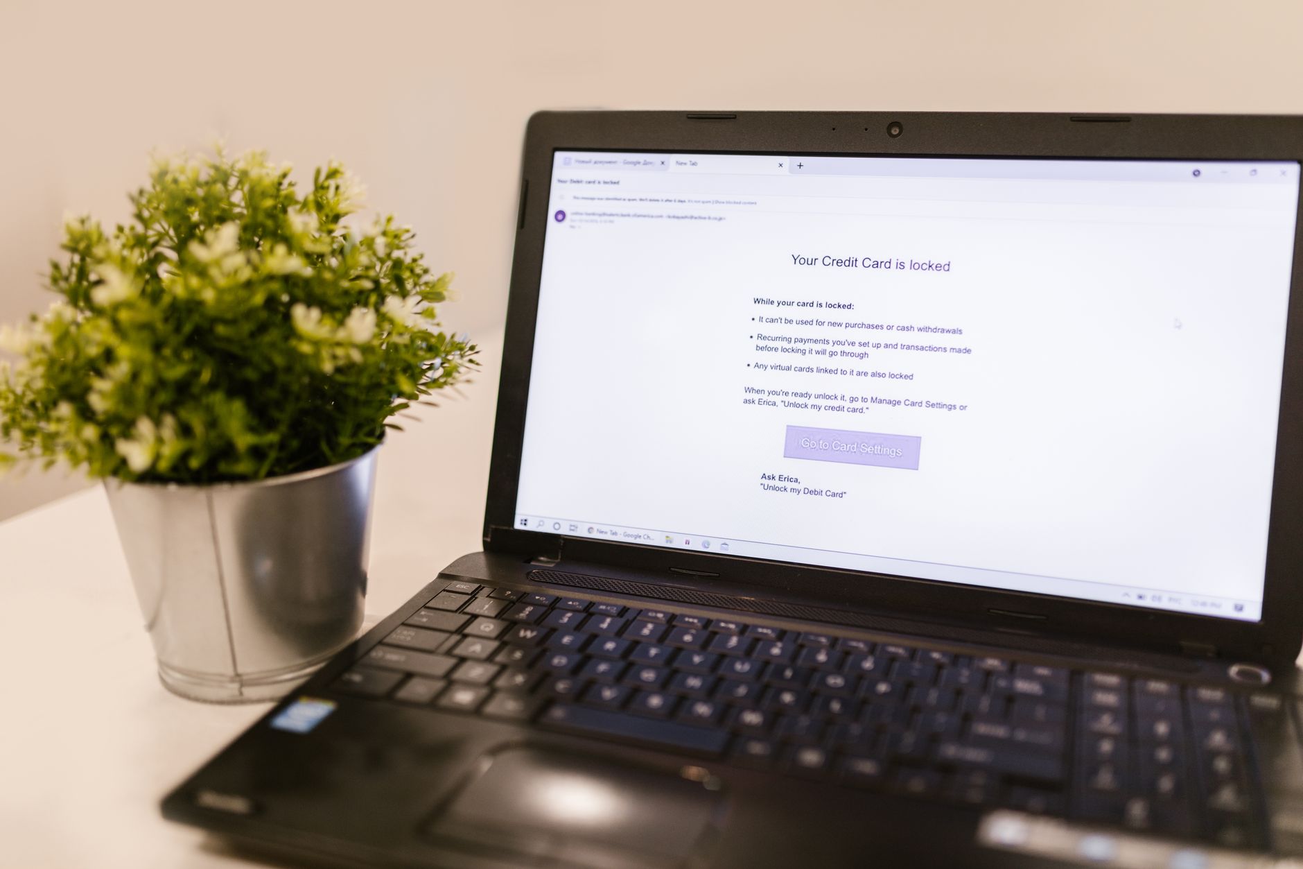 a person changing account password on a laptop with a security lock icon on screen